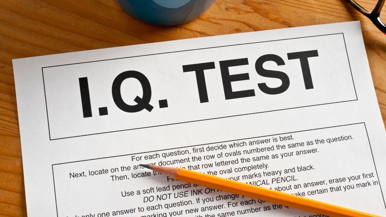IQ test on paper with a pencil in the traditional way.